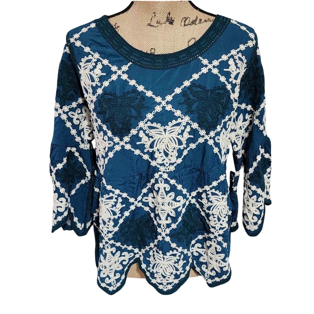 Anthropologie x Kindred teal and white‎ heavily embroidered triangle trim shirt